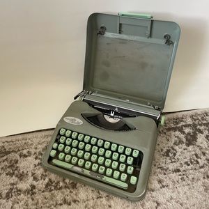 SOLD Hermes vintage seafoam green rocket typewriter